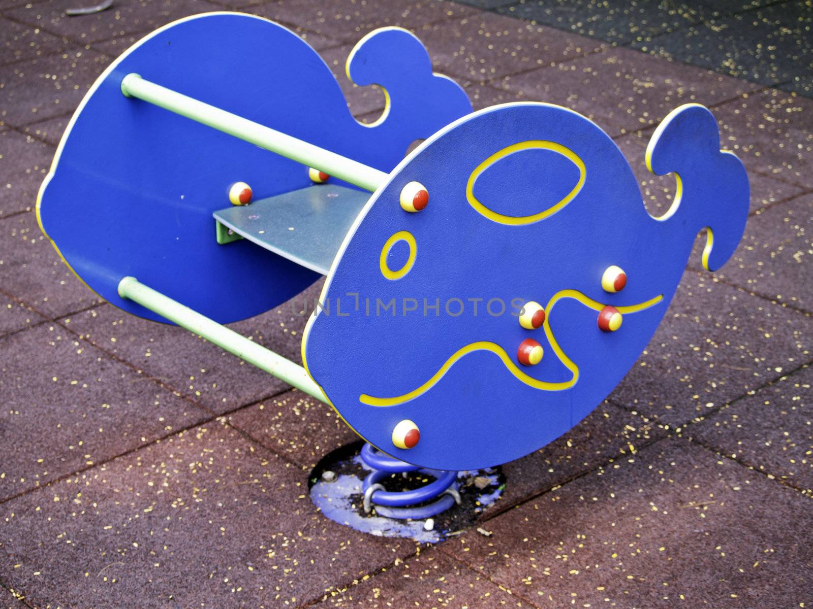 whale rocking chair in playground