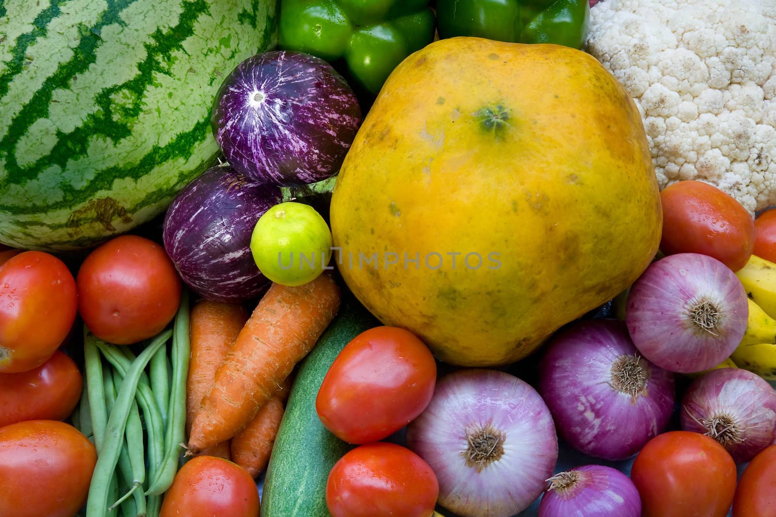 fresh vegetables and fruits on wooden table after market 