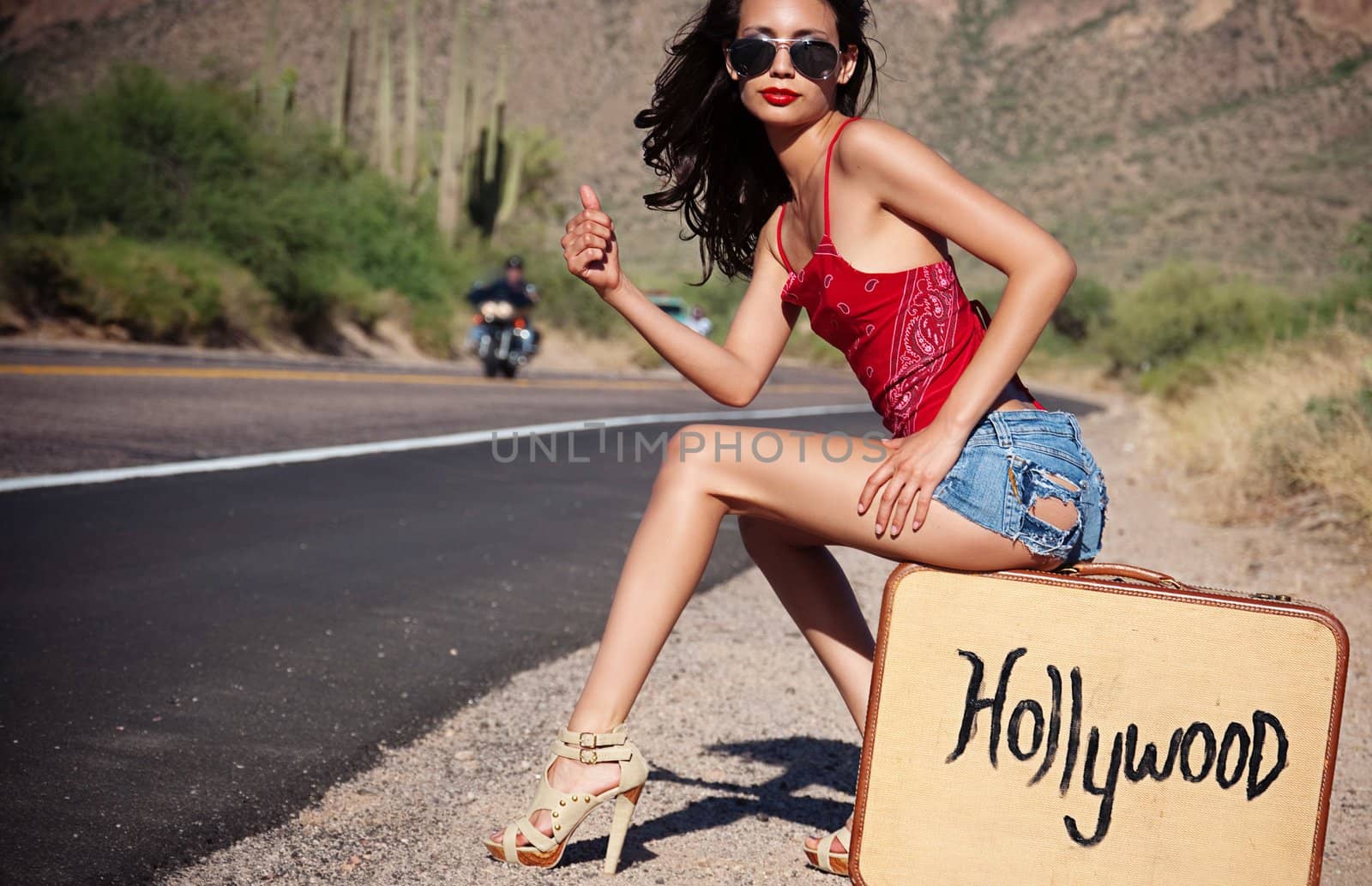 Young beautiful woman hiking to Hollywood. by Paulmatthewphoto