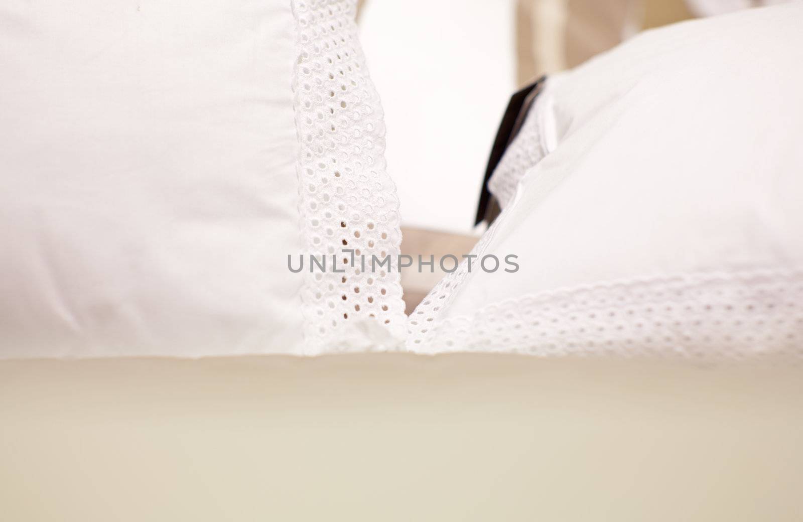 White pillows on a bed