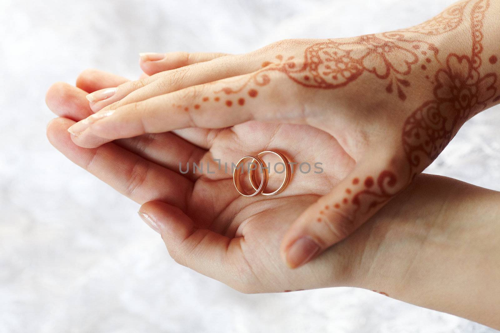 Picture mehandi on the hand of girl