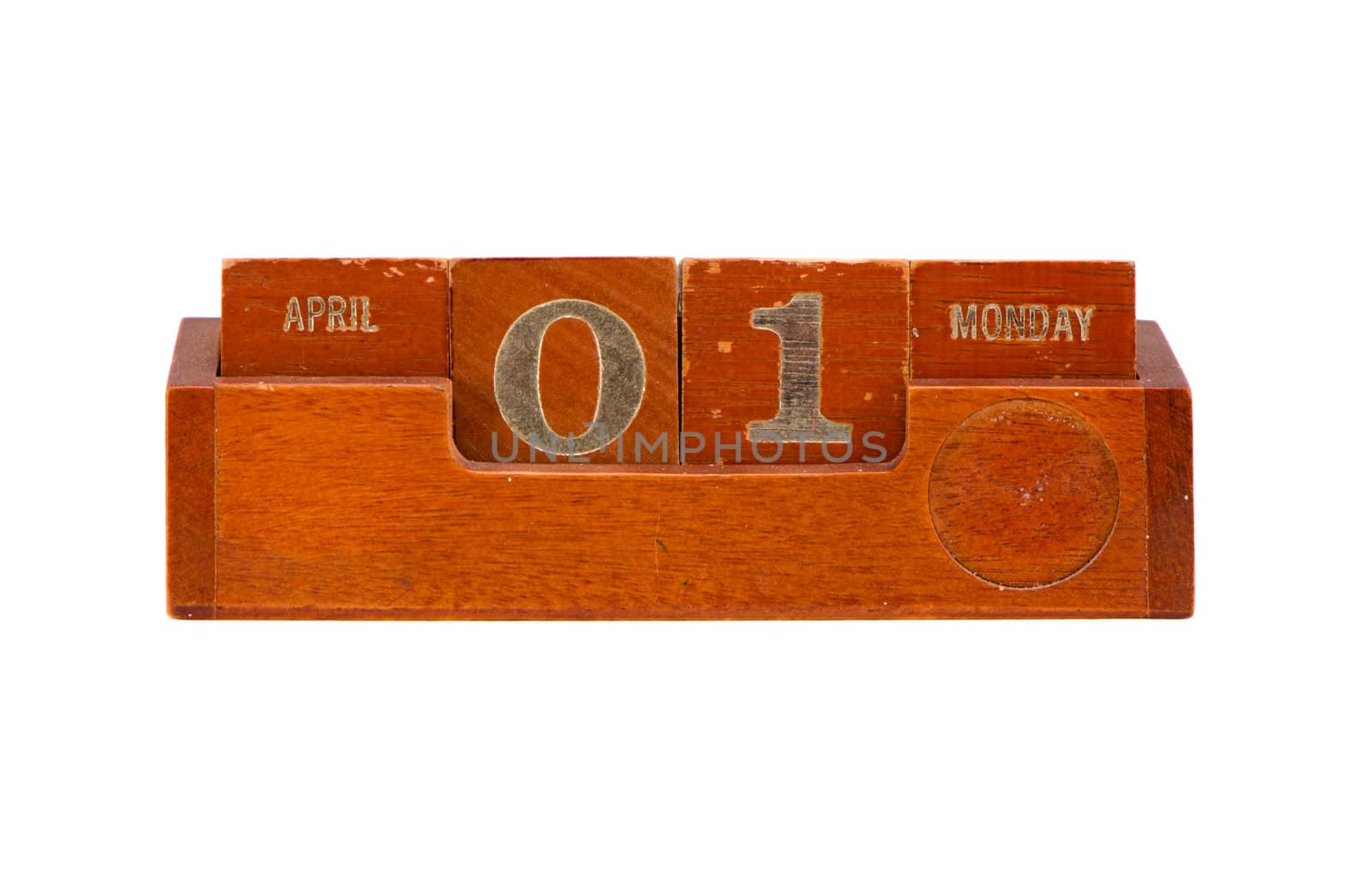 antique wooden calendars from separate blocks and stand with liars day date isolated on white background