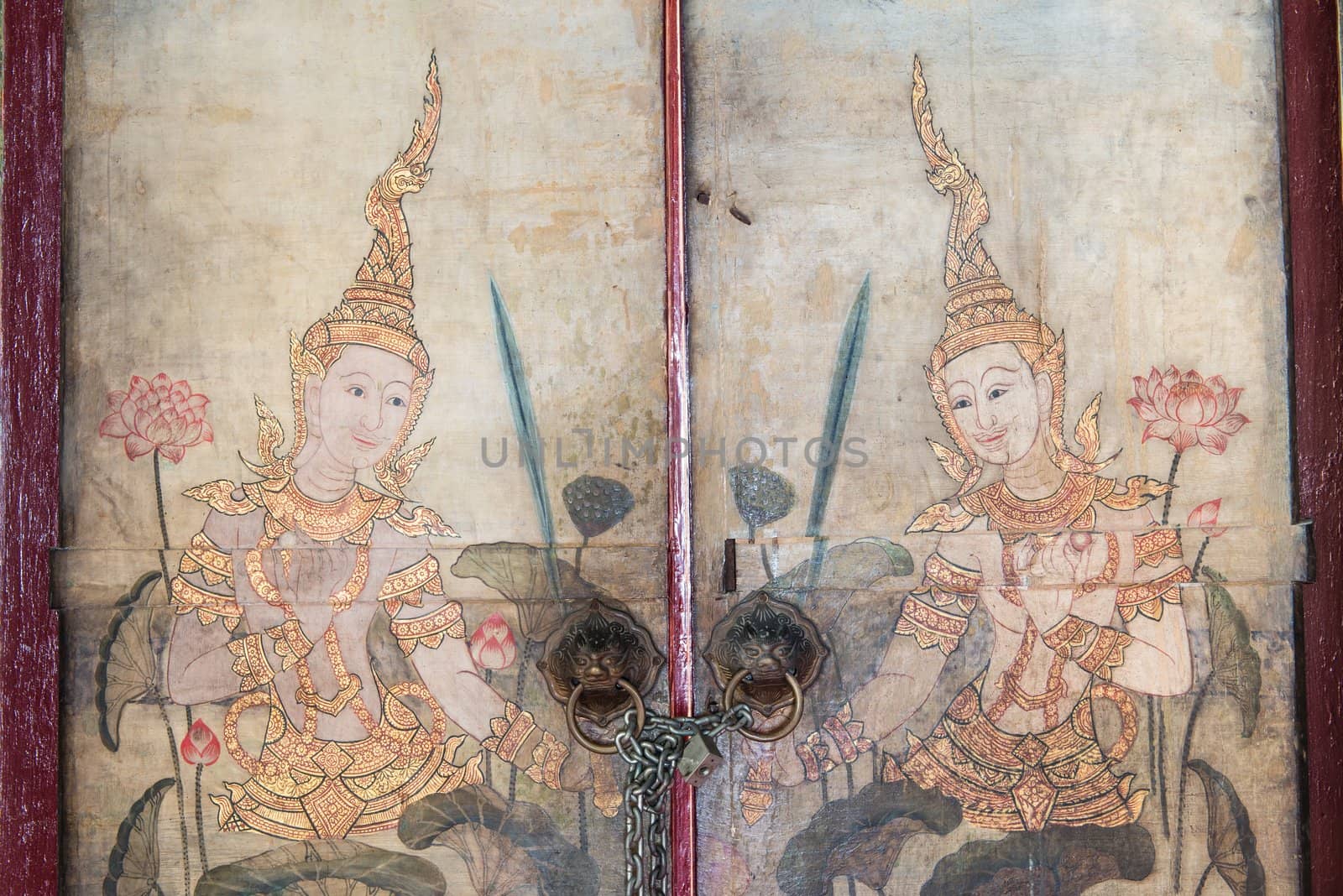 Very old vintage door with Buddha gods painting on it by sasilsolutions