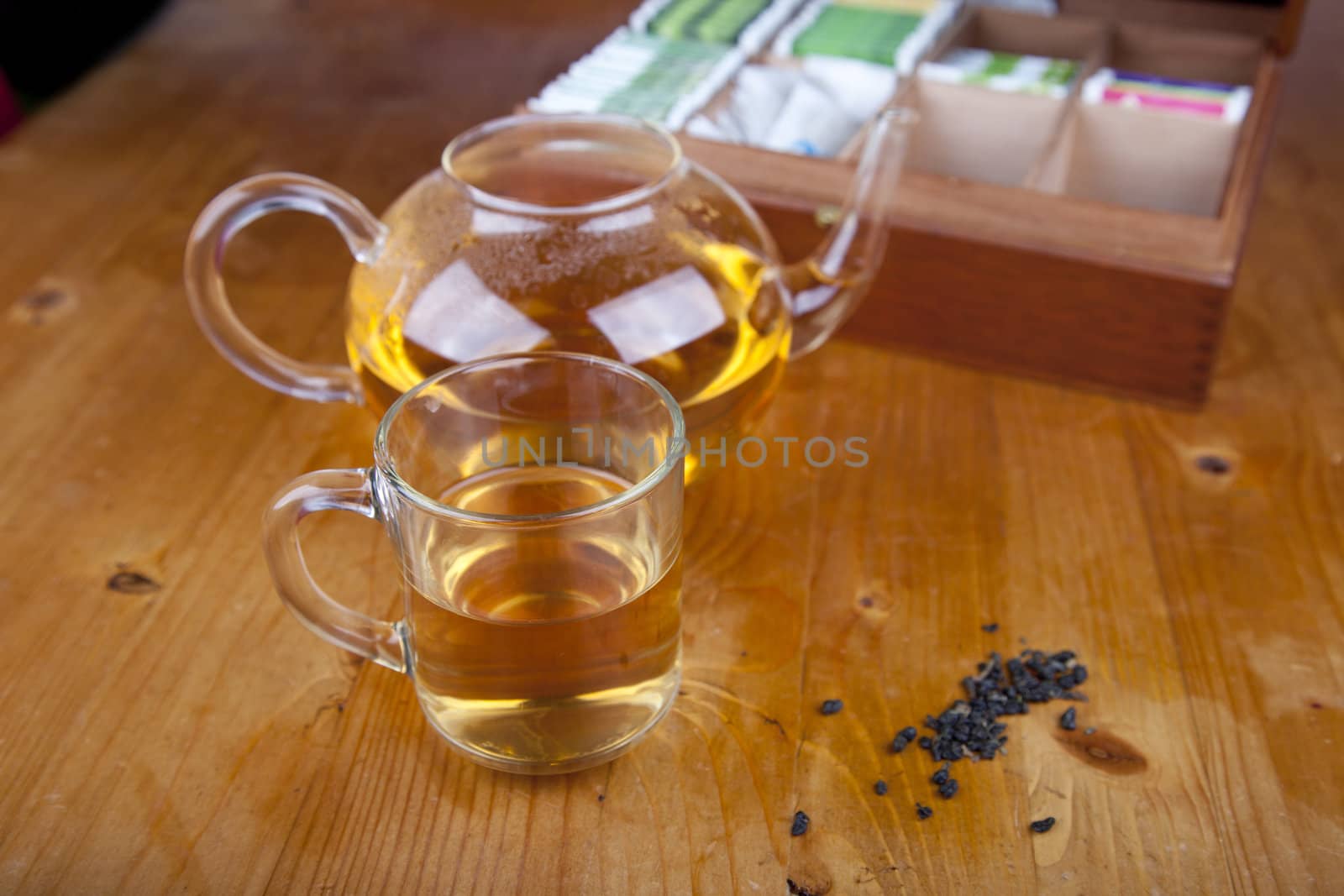 Tea cup with tea on wooden table