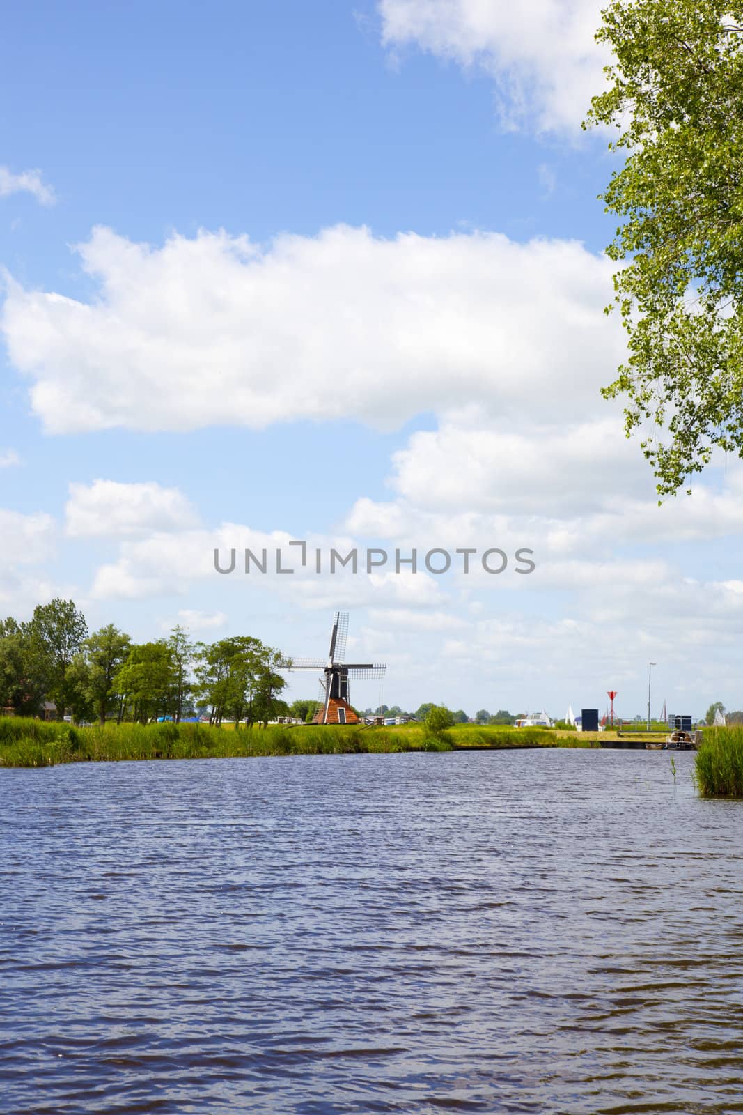 Old mill with beautiful blue sky