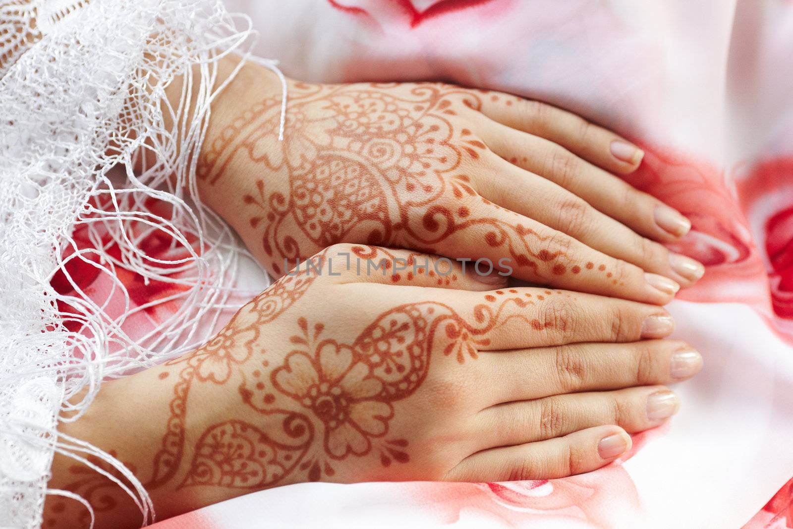 Picture mehandi on the hand of girl
