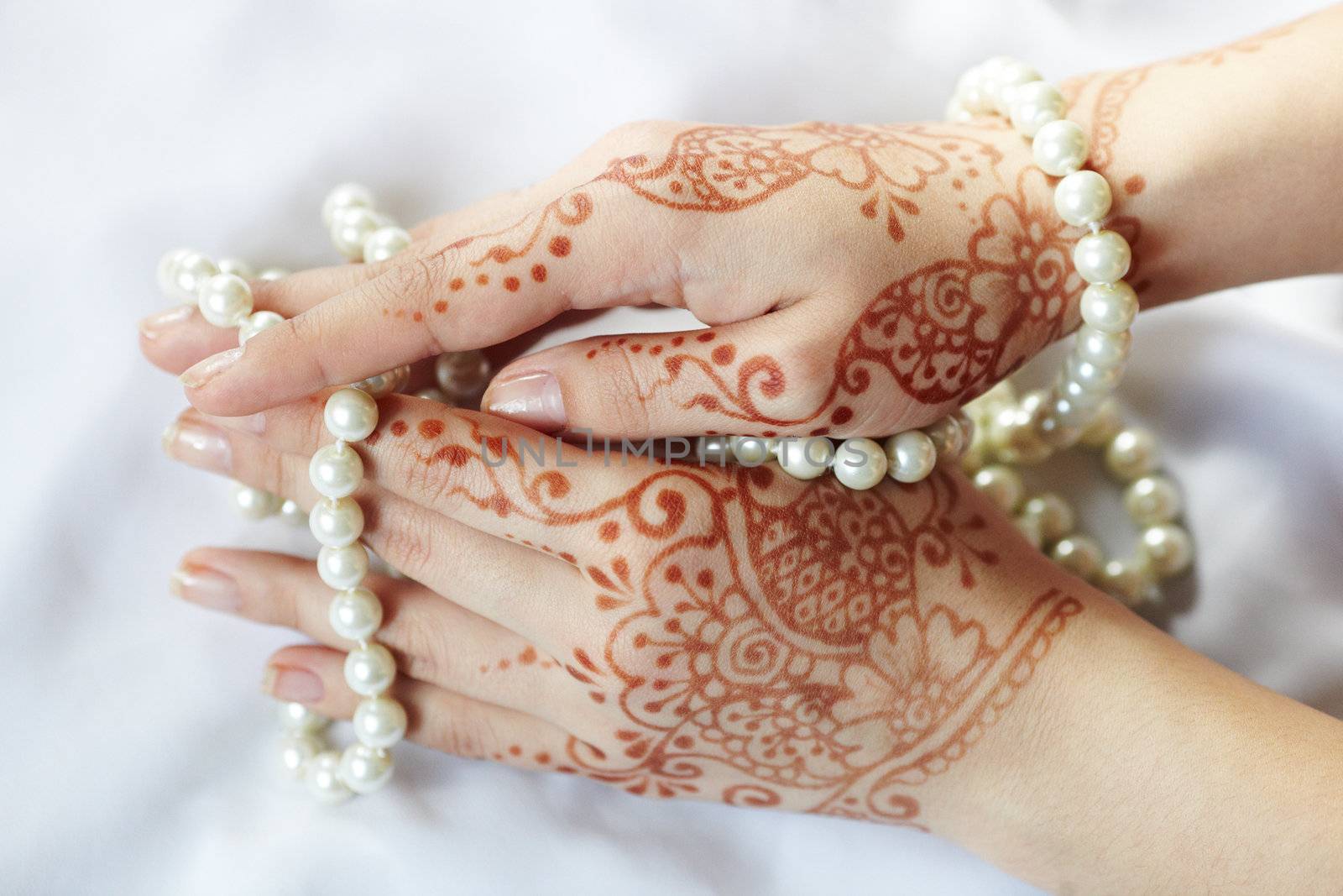 Picture mehandi on the hand of girl