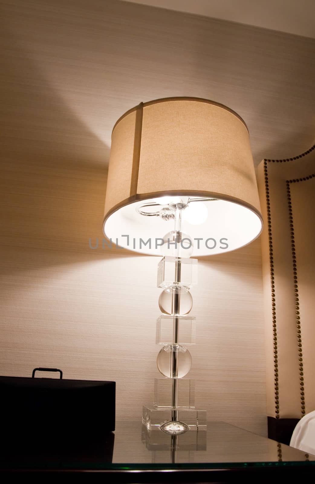 Lit lamp in a room