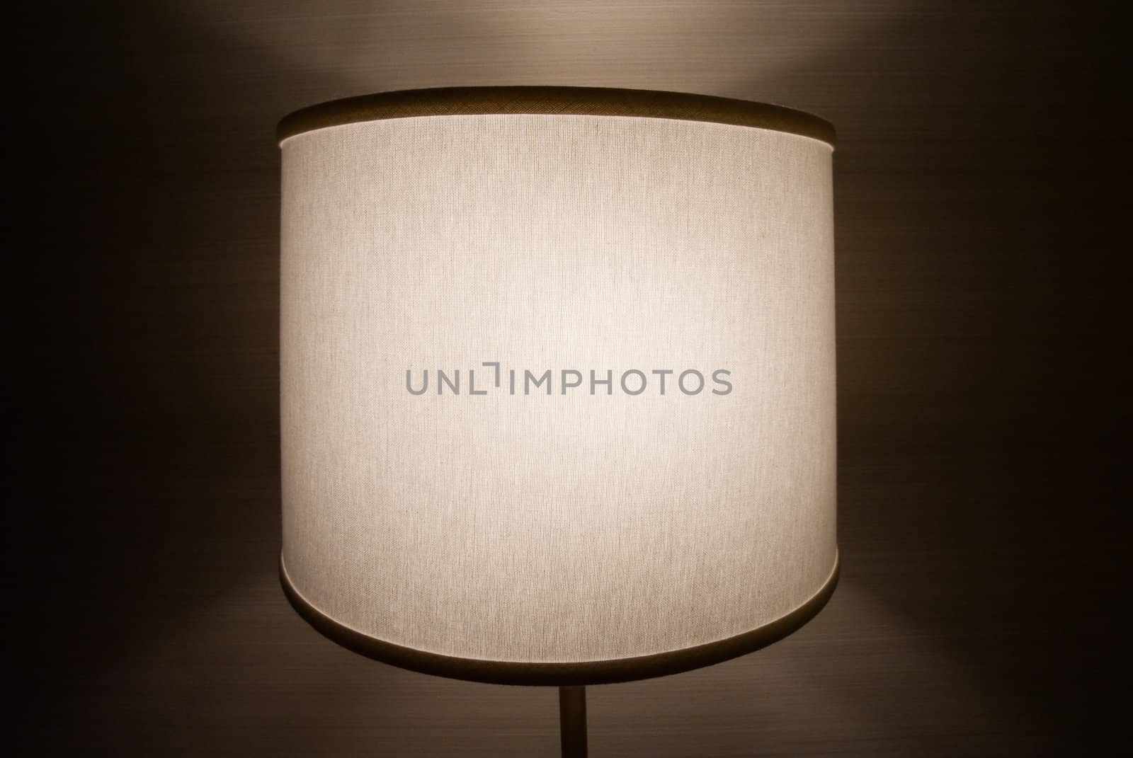 Lit lamp in a room