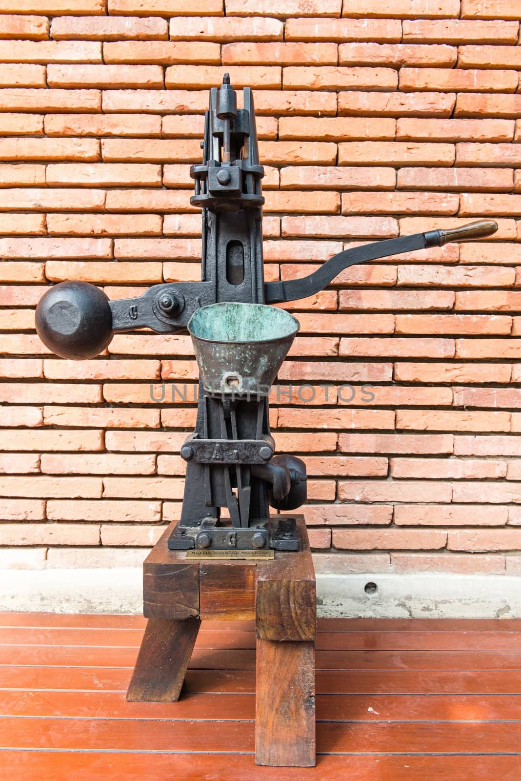 Vintage rusty steel and wooden wine bottle processing equipment, useful for background