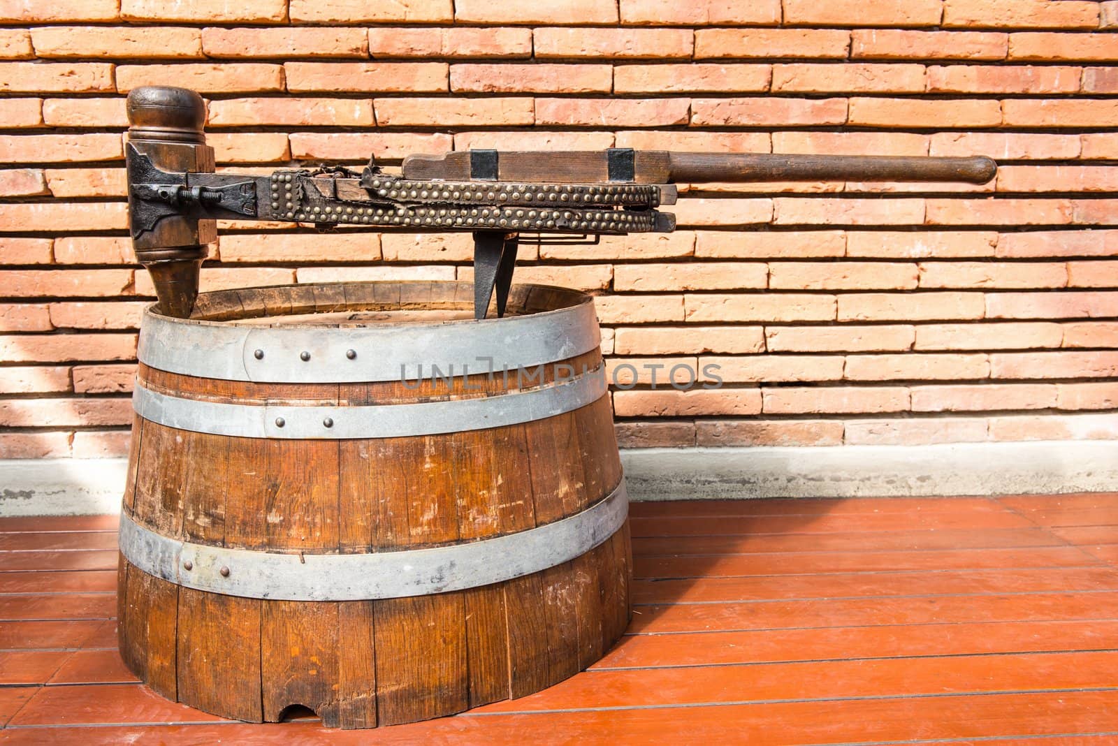 Vintage rusty steel and wooden wine bottle processing equipment, useful for background