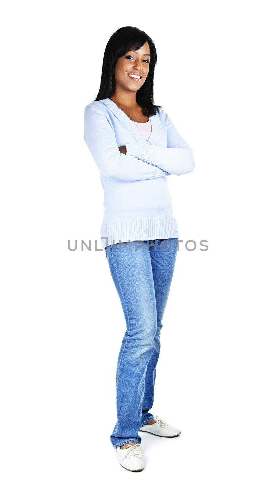 Confident black woman with arms crossed standing isolated on white background