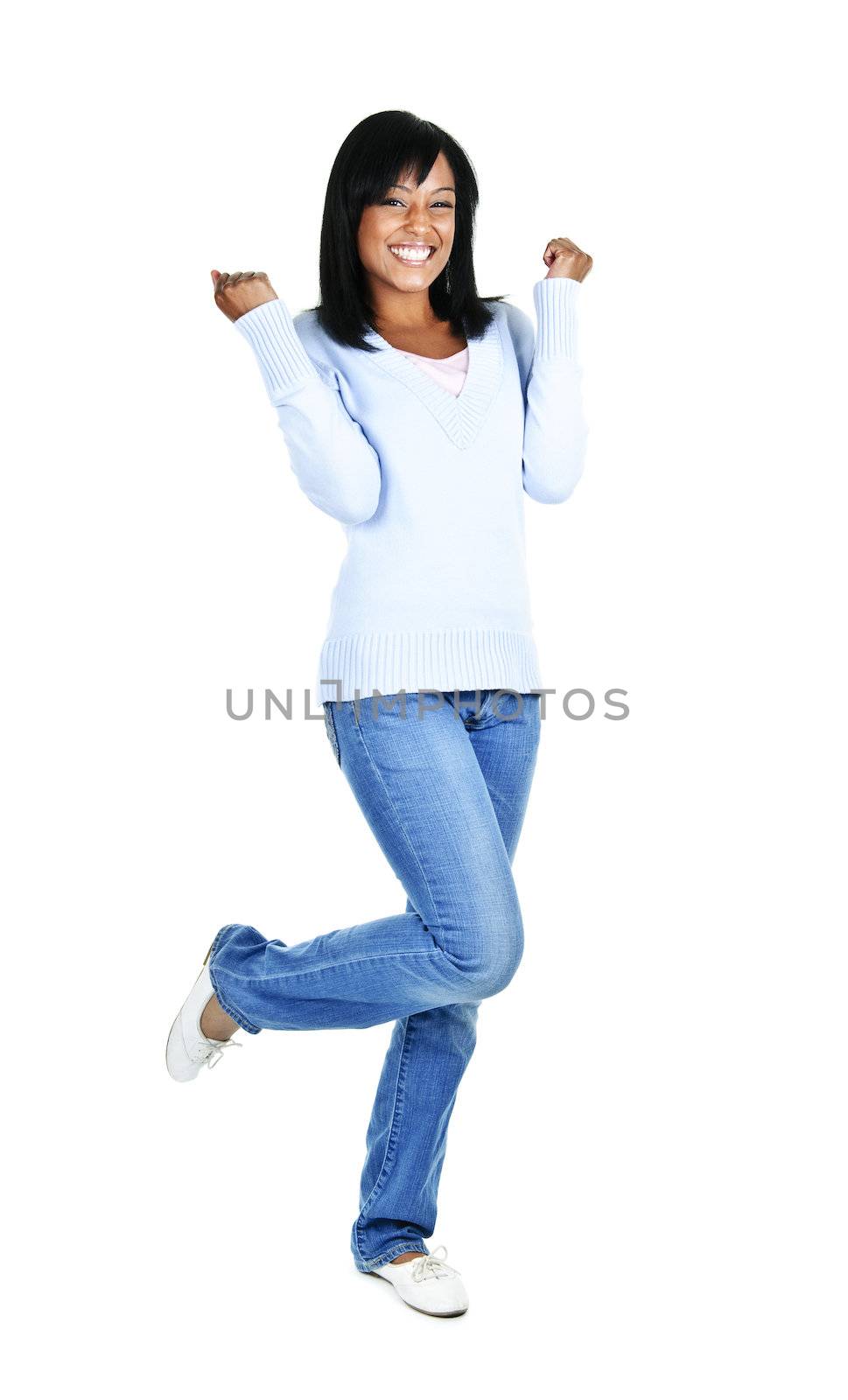 Happy black woman celebrating isolated on white background