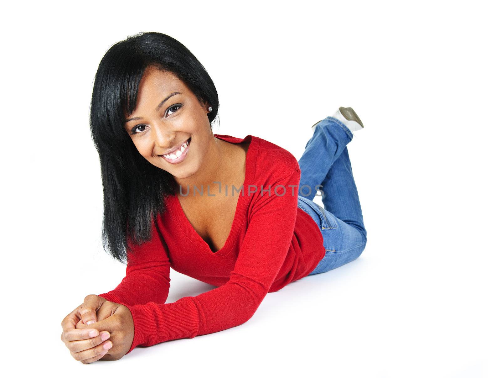 Portrait of black woman smiling laying isolated on white background