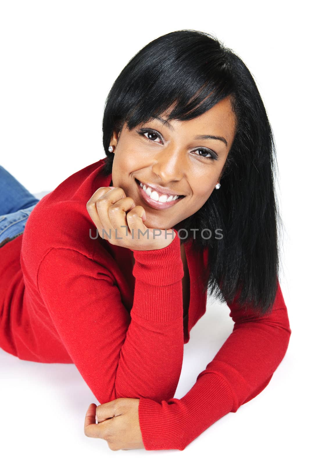 Portrait of young black woman smiling by elenathewise