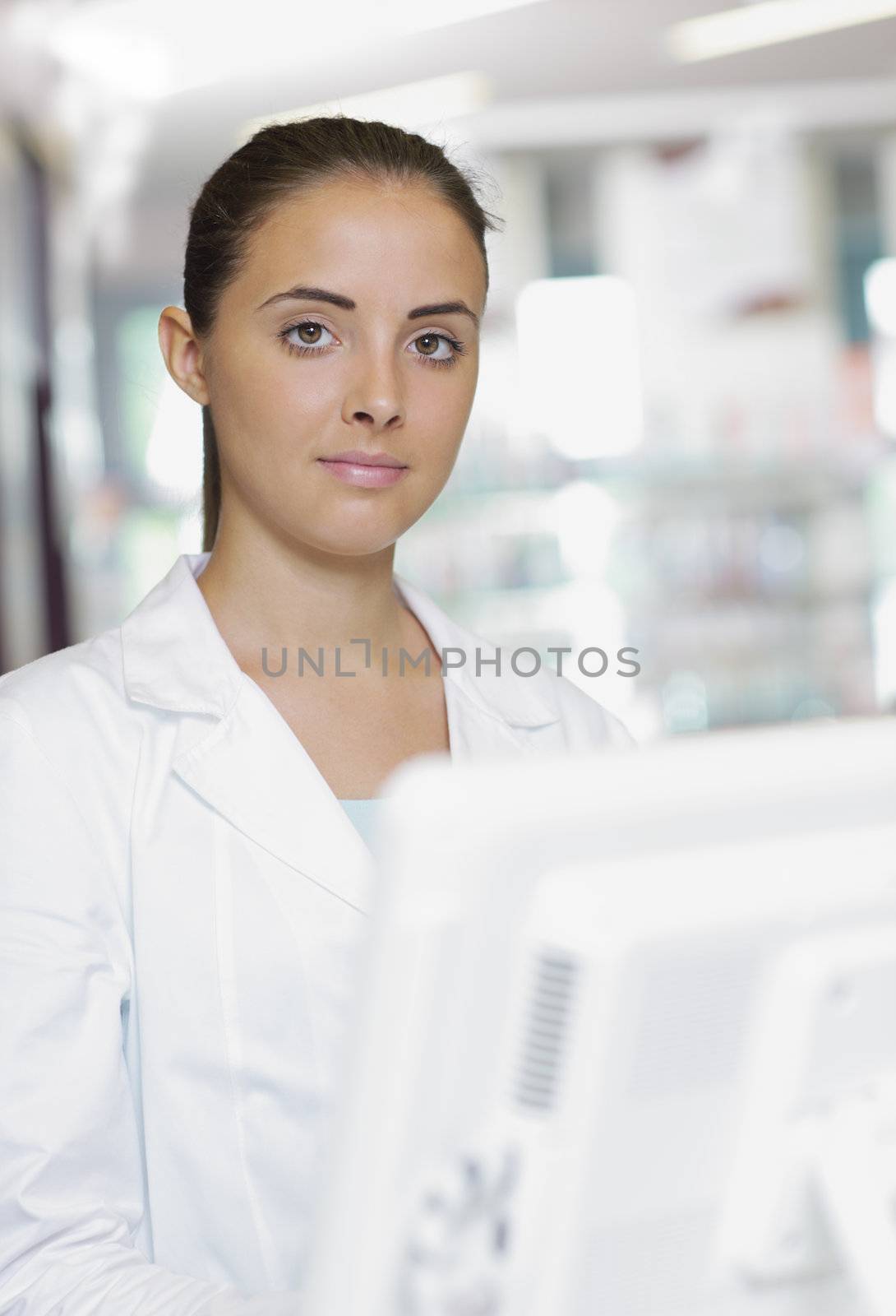 Environmental Portrait of a medical personnel, or doctor in pharmacy