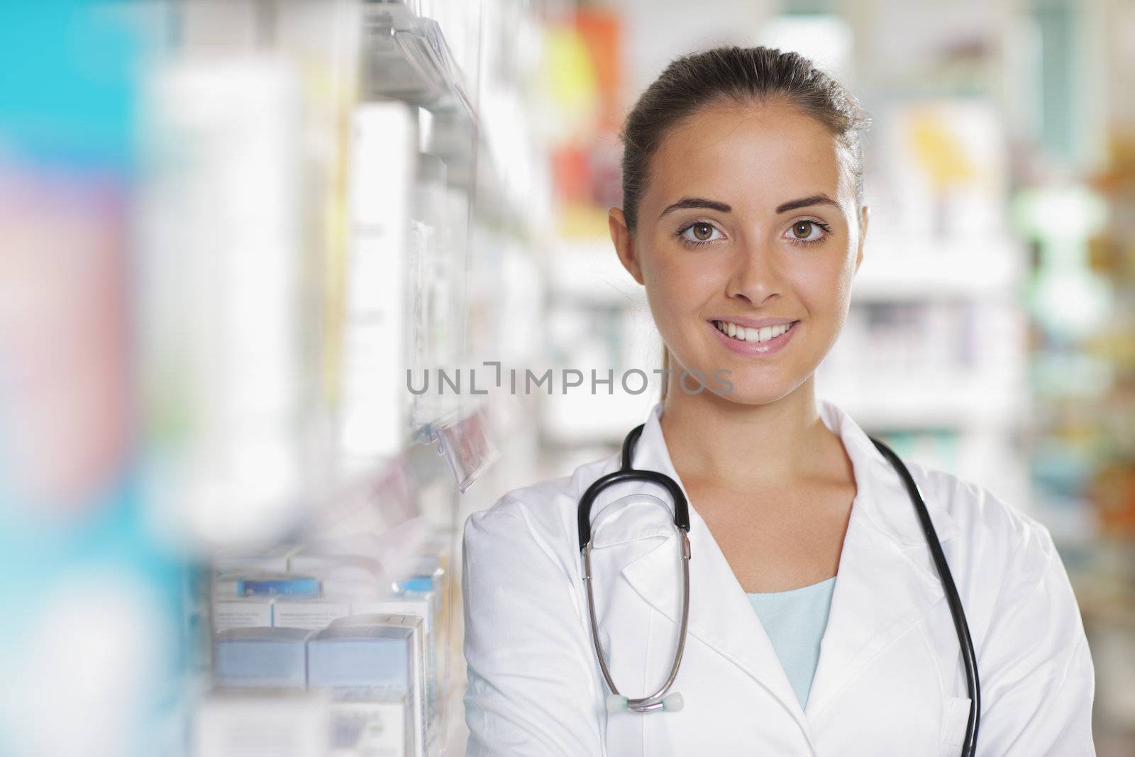 Young woman doctor in pharmacy