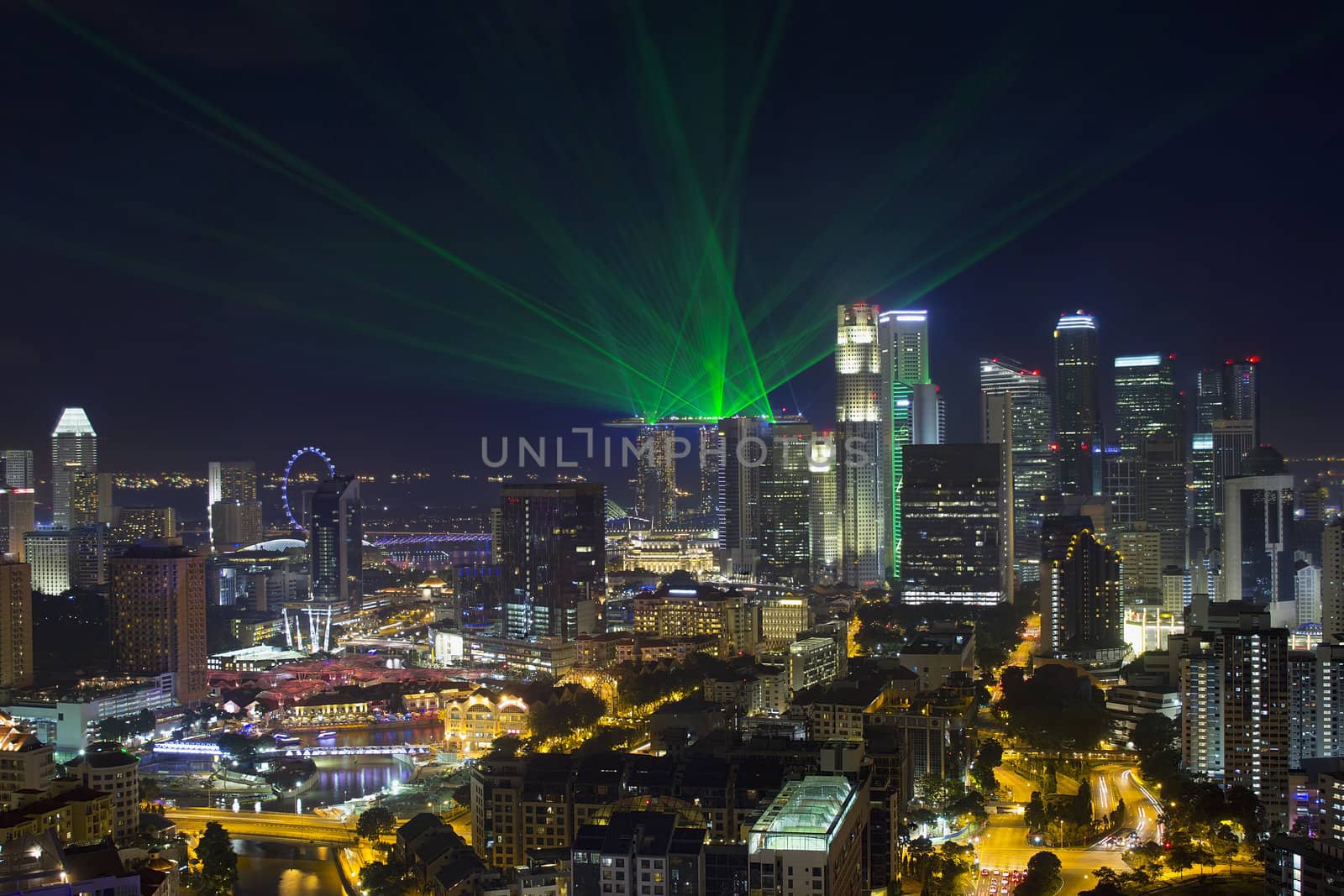 Singapore Central Business District Skyline and Laser Light Show at Blue Hour Evening