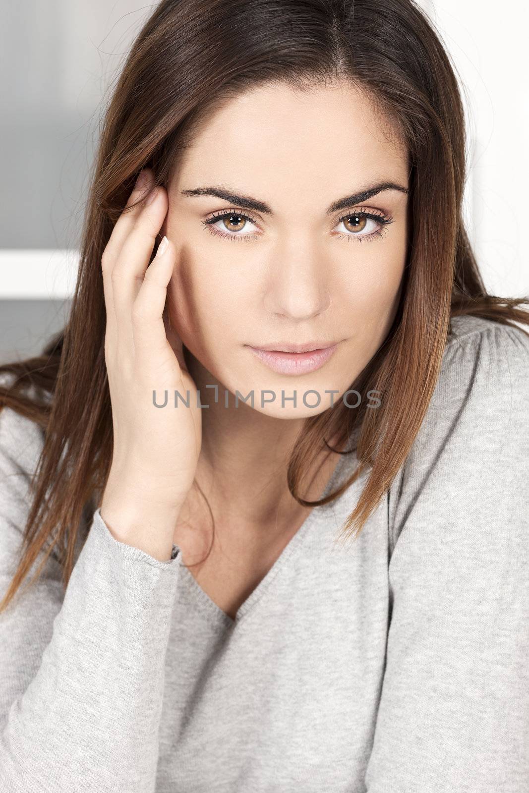 Portrait relaxed young woman at home