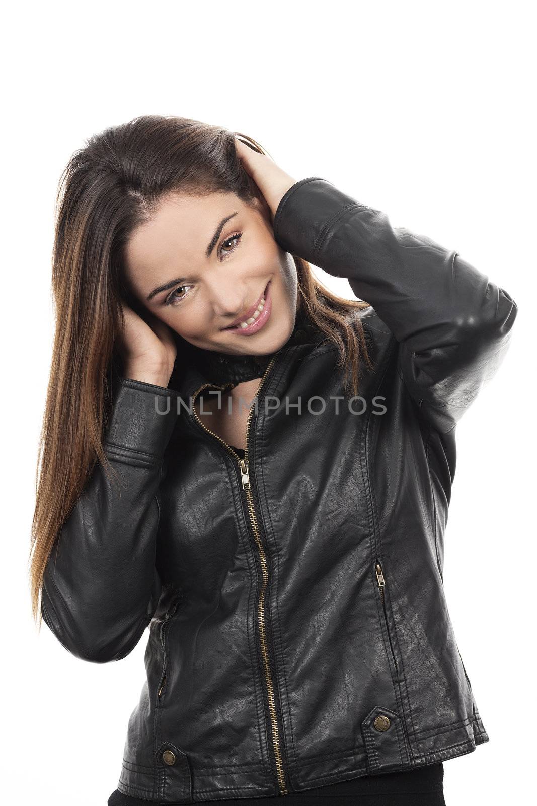 brown hair woman with hand in hair on white background