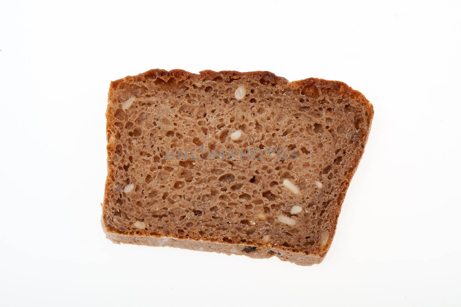 Slice of dark bread isolated over white 