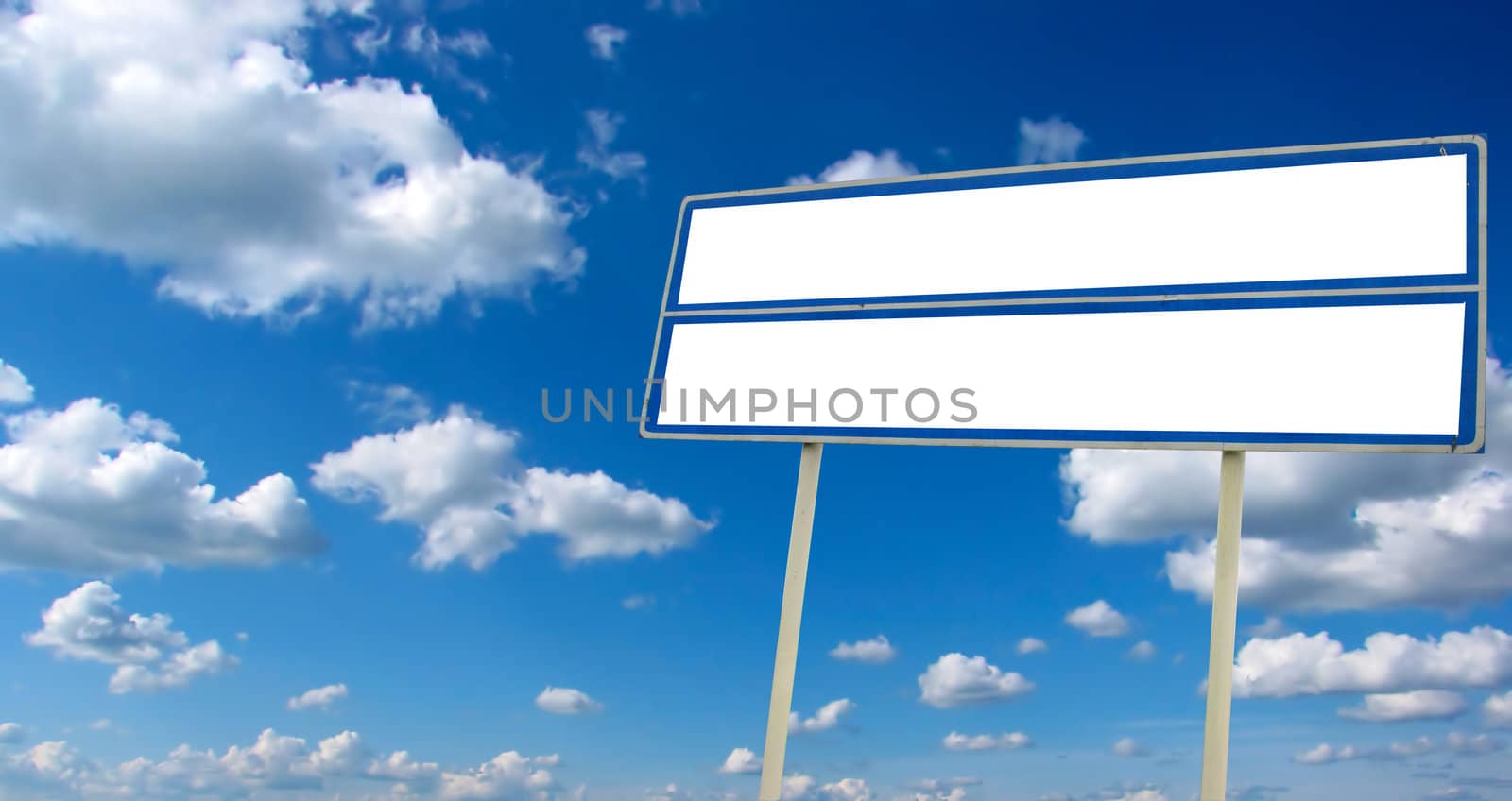 Wide Billboard on the Summer Sky Background