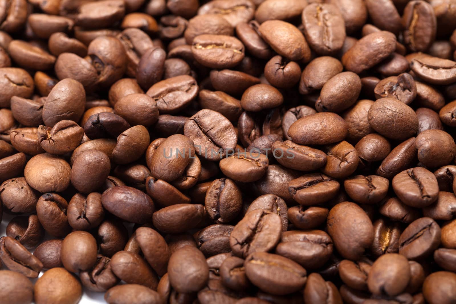 coffee beans close up isolated on white
