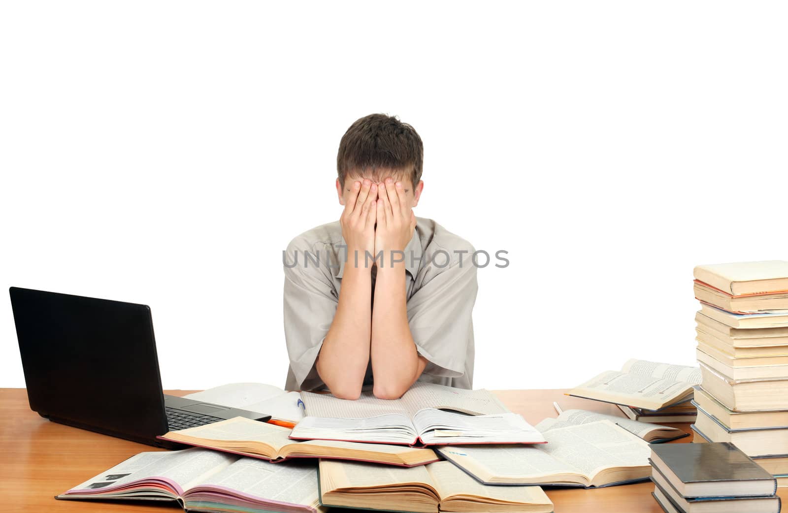 Sad Student on the School Desk hide his Face. Isolated on the White