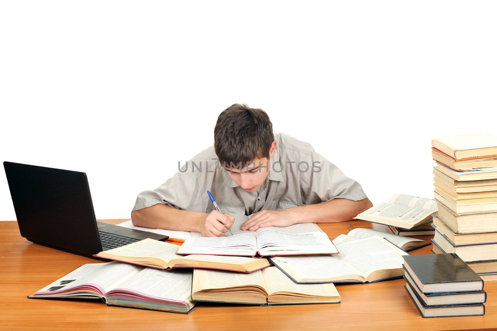 Student on the School Desk is Writing