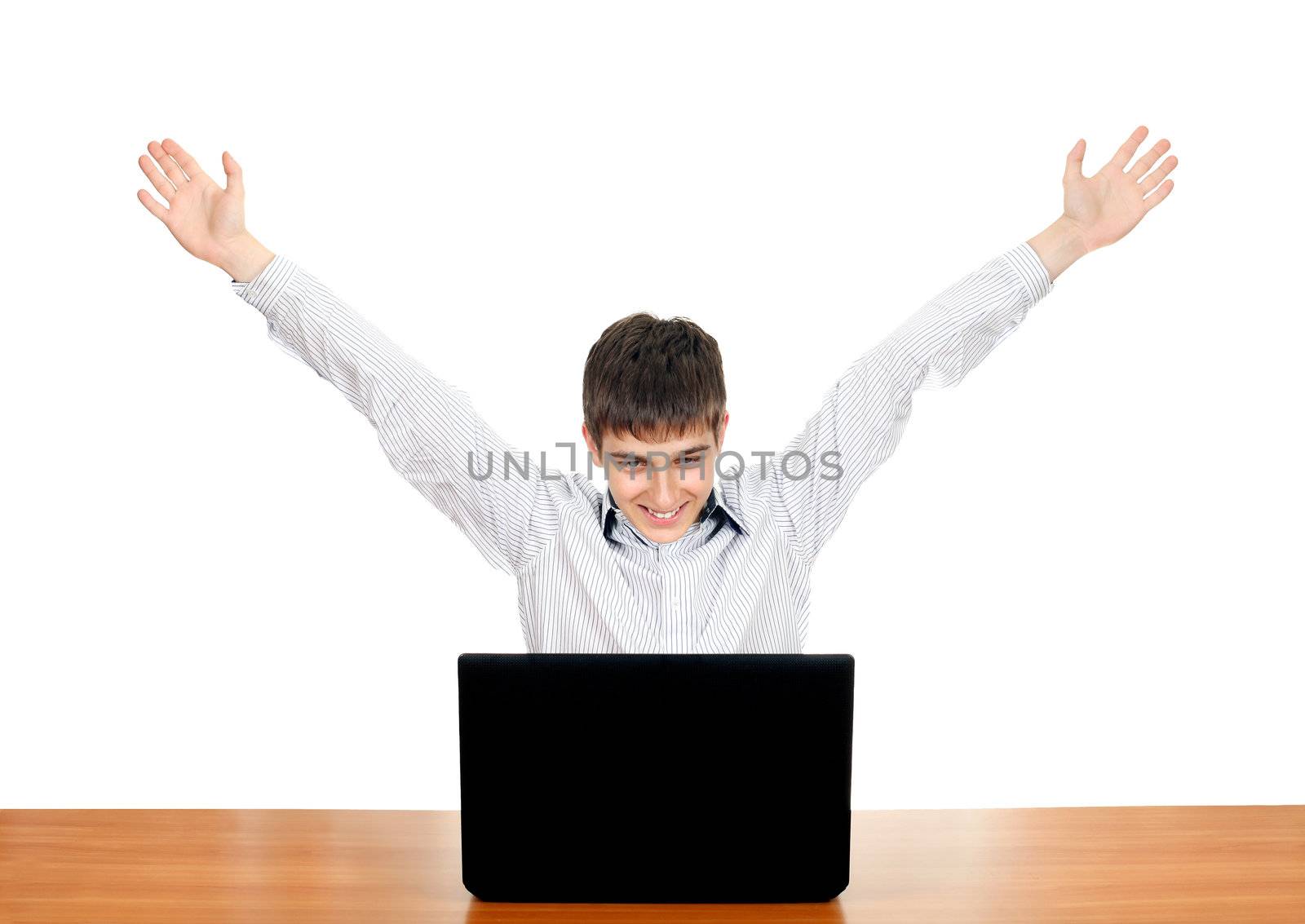 Happy Teenager with Laptop raise his hands. Isolated on the White Background