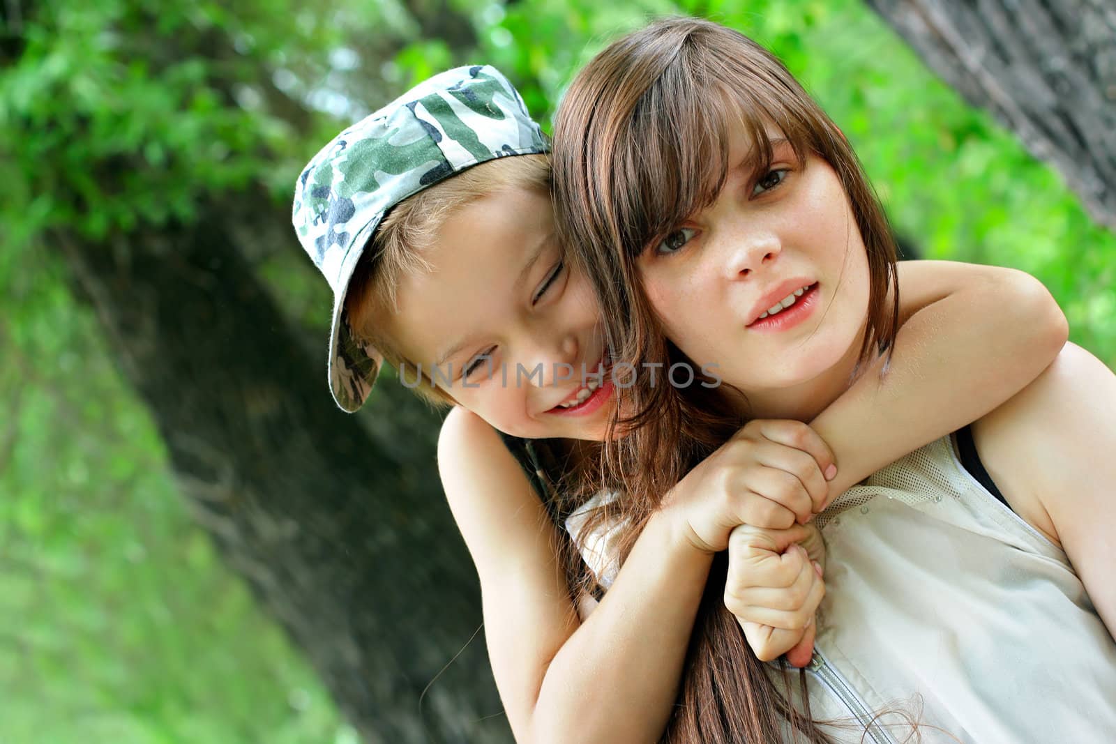 Happy Brother and Sister portrait outdoor