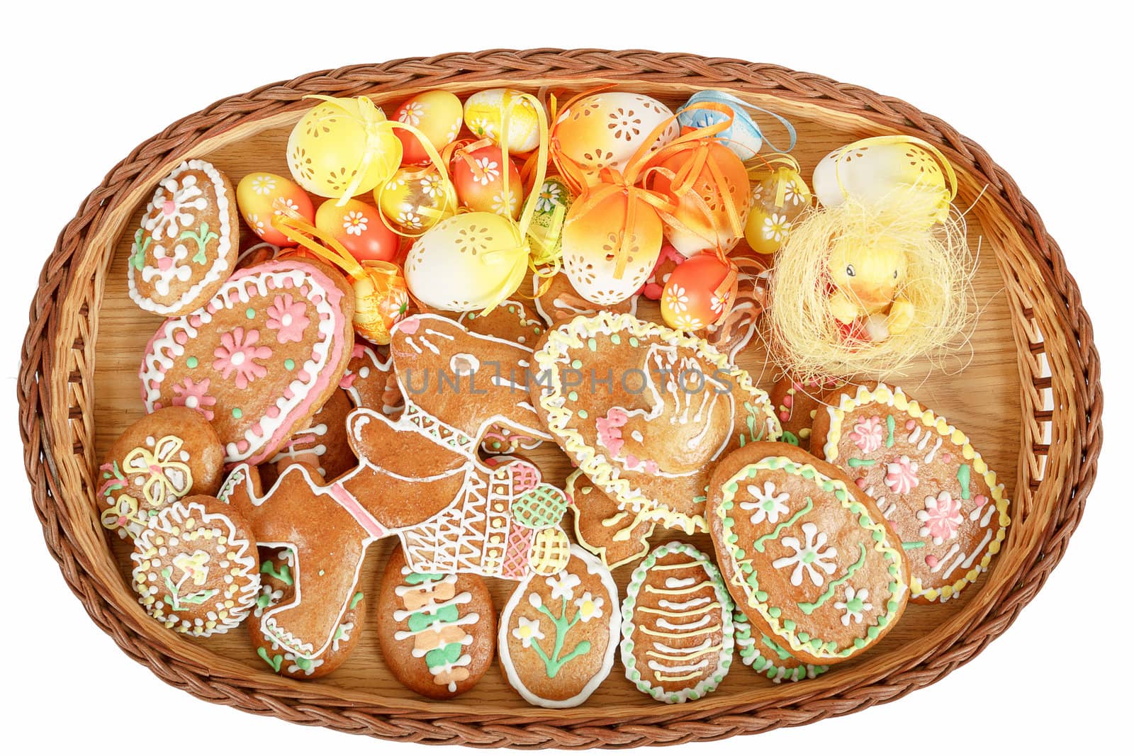 collection of easter gingerbreads and painted eggs isolated on white