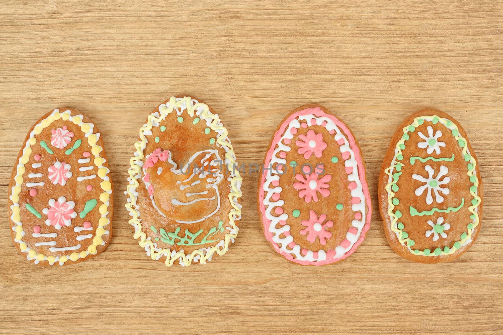 Easter gingerbreads collection on wooden background