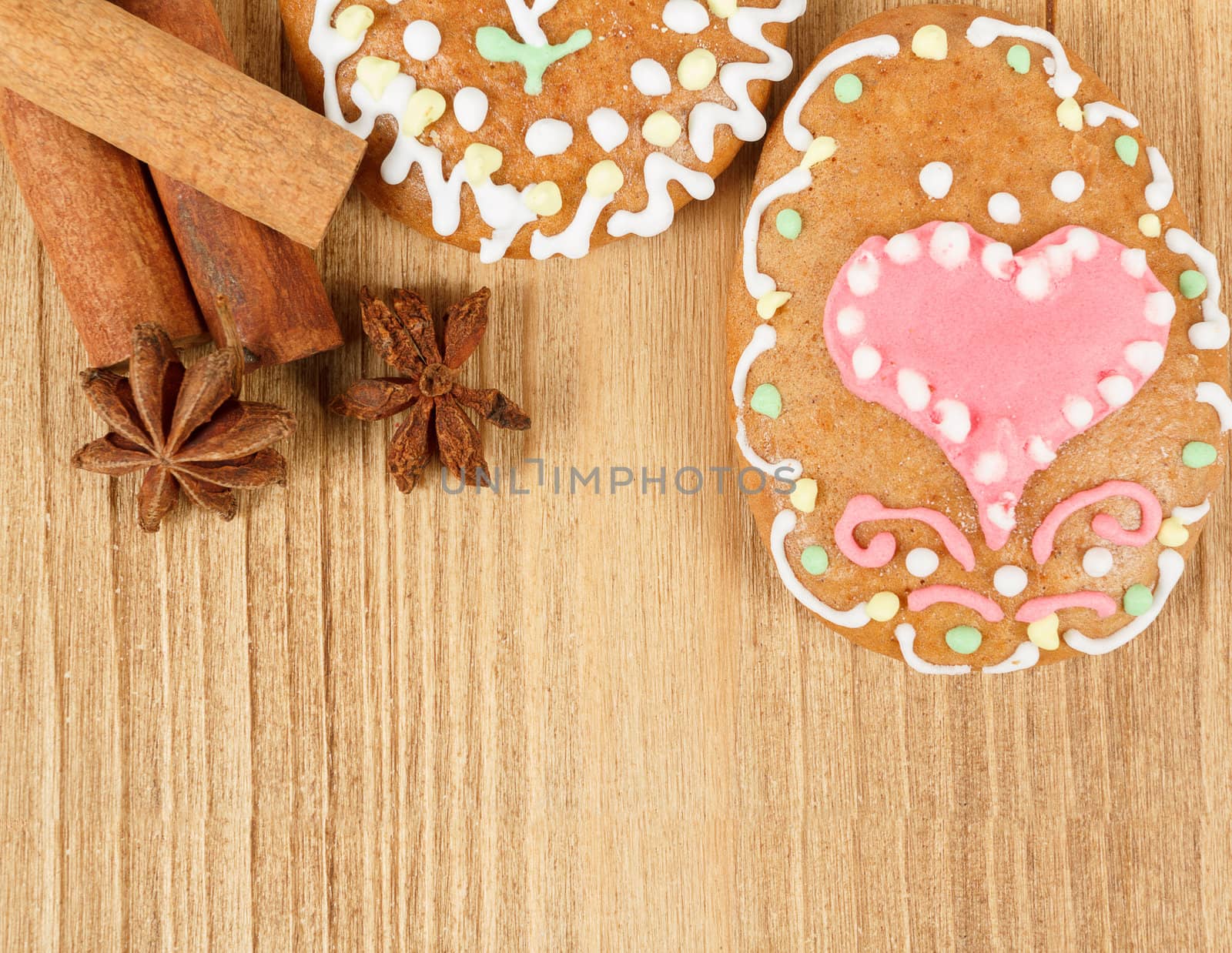 easter gingerbread, cinamon and star anise on wooden background