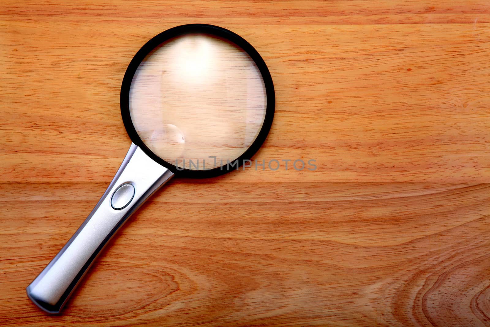 Loupe On The Table by sabphoto