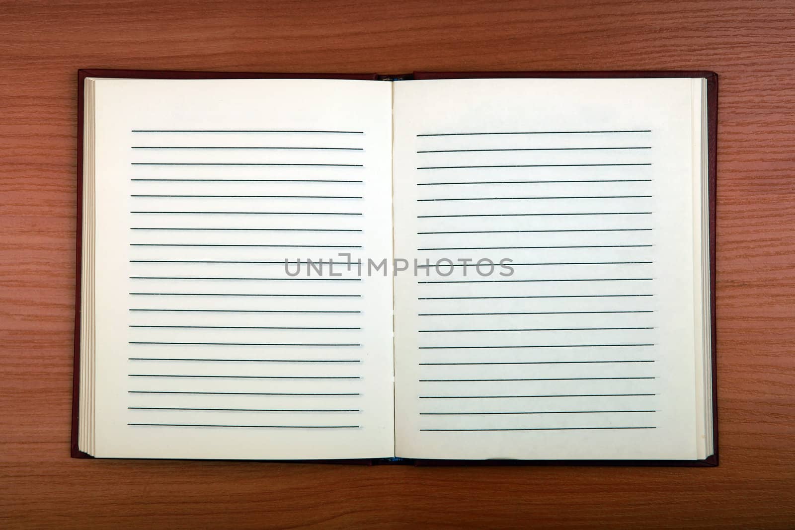 Blank Writing Pad on the Wooden Background