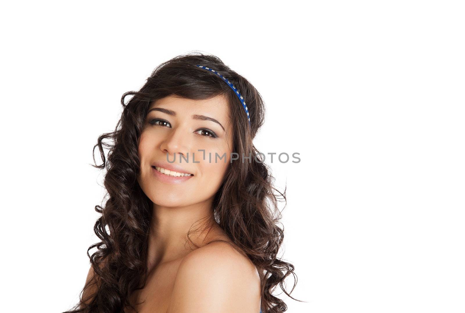 Beauty portrait of a beautiful brunette smiling on white background.