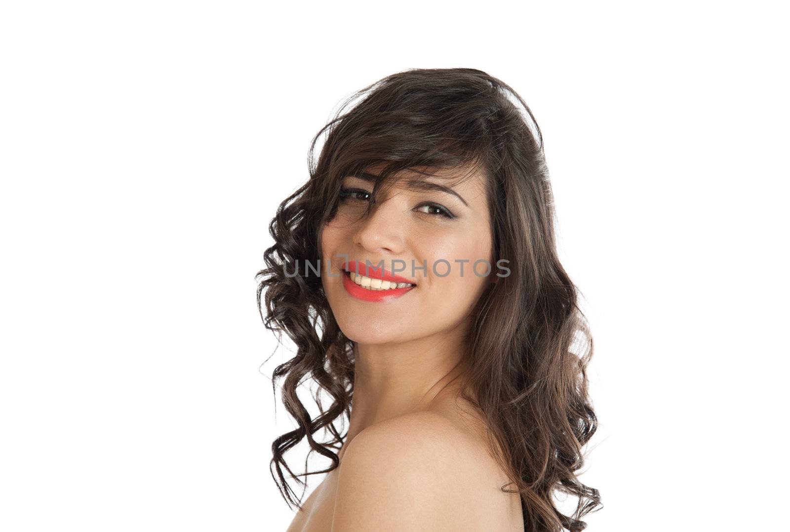 Beauty portrait of a beautiful brunette smiling on white background.