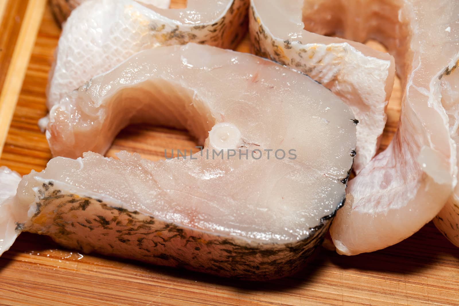 Piece of fresh raw fish. The healthy diet.