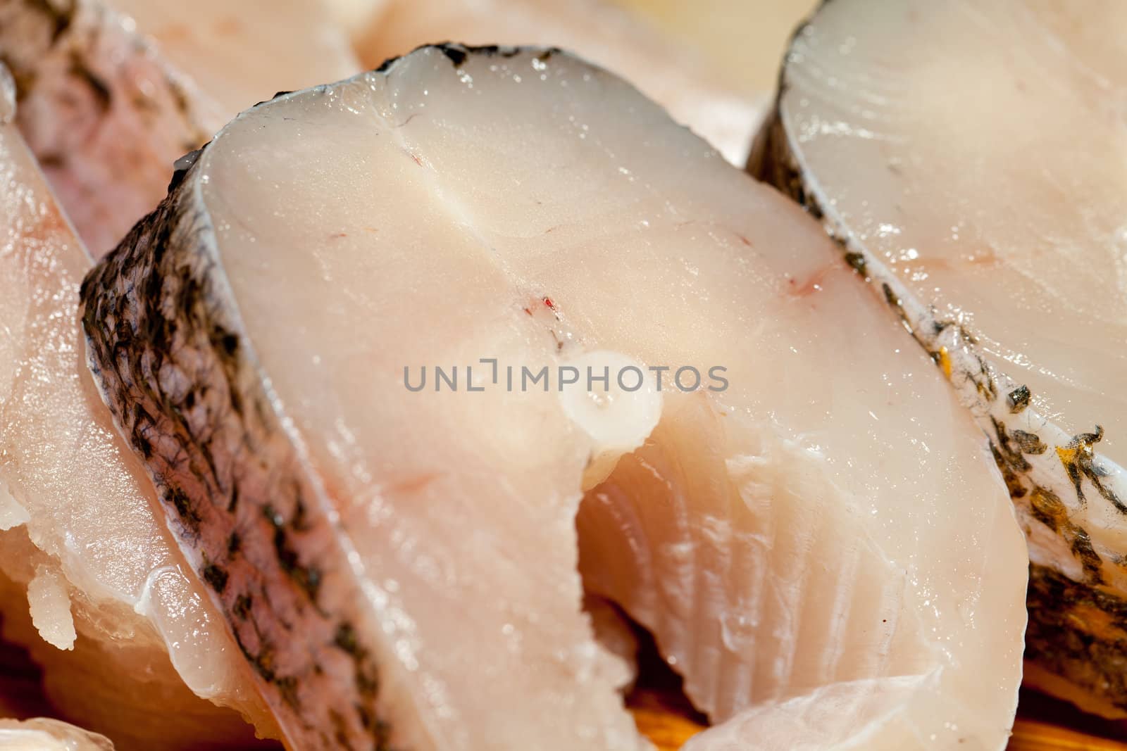 Piece of fresh raw fish. The healthy diet.