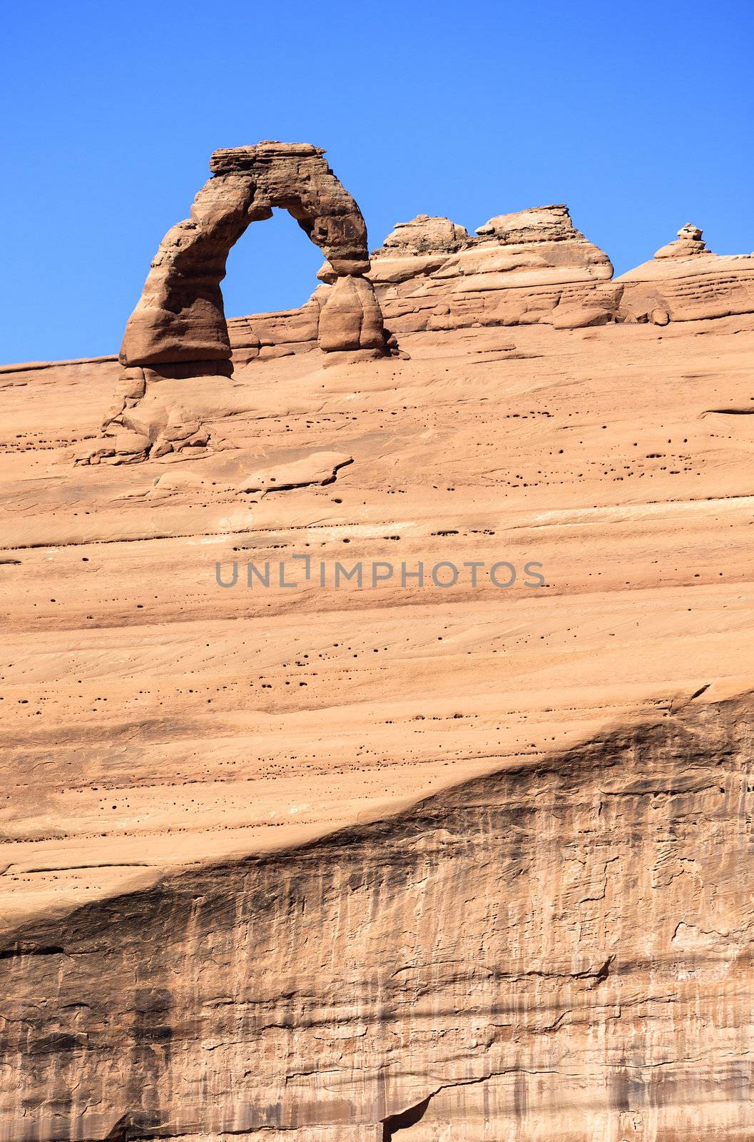 View of Delicate Arch abd cliff, USA