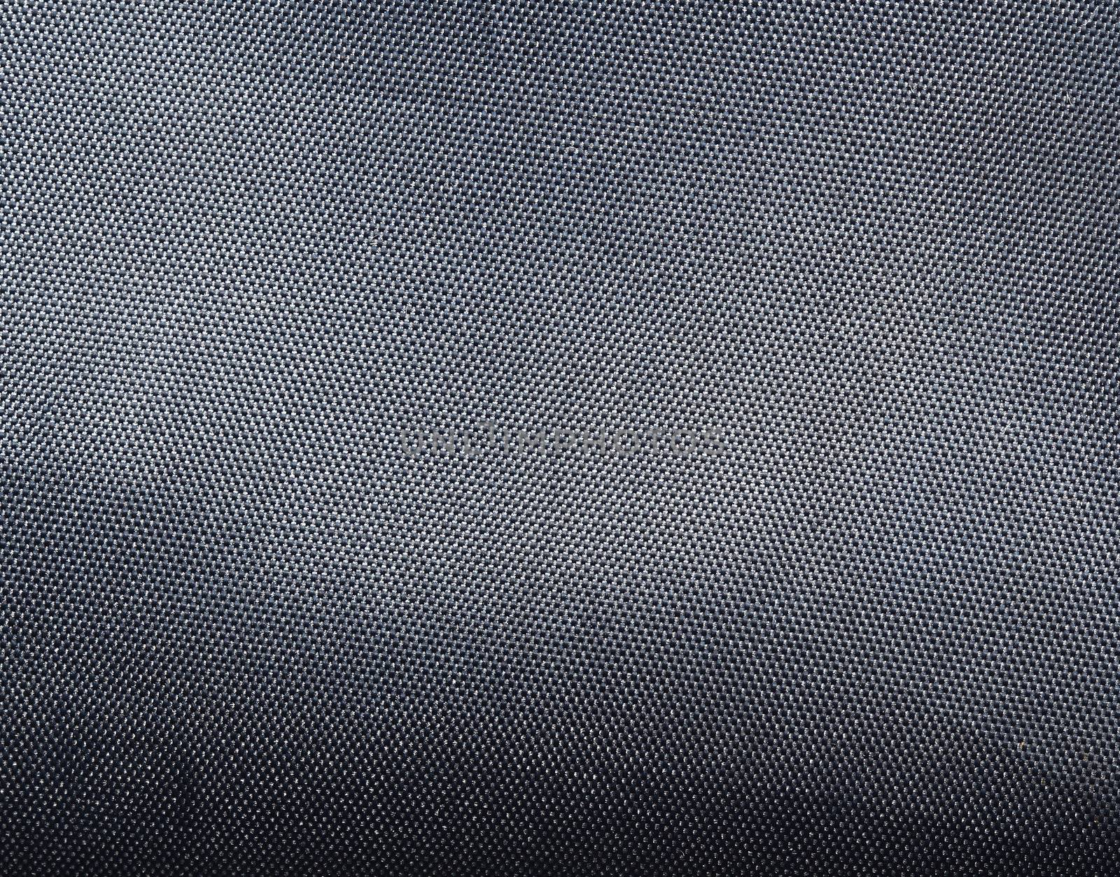 Black polyester texture background. Close up