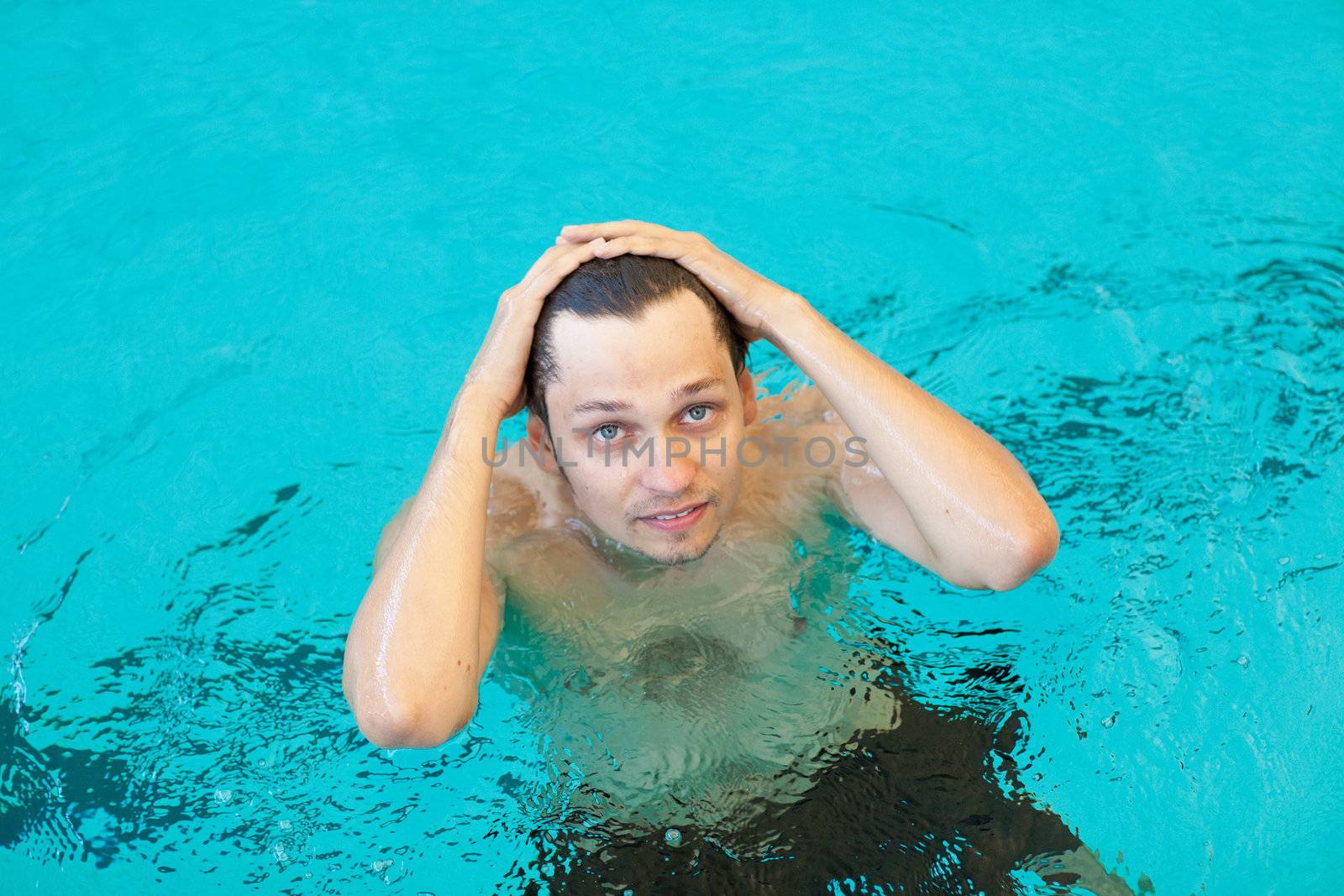 portrait of a man in a swimming pool