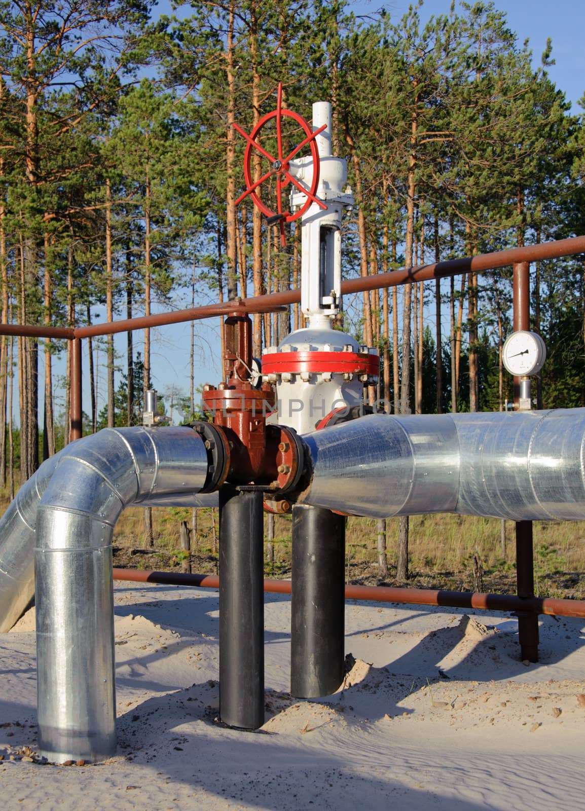 Oil Industry. Gas pipeline with a red gate. Western Siberia, Russia.