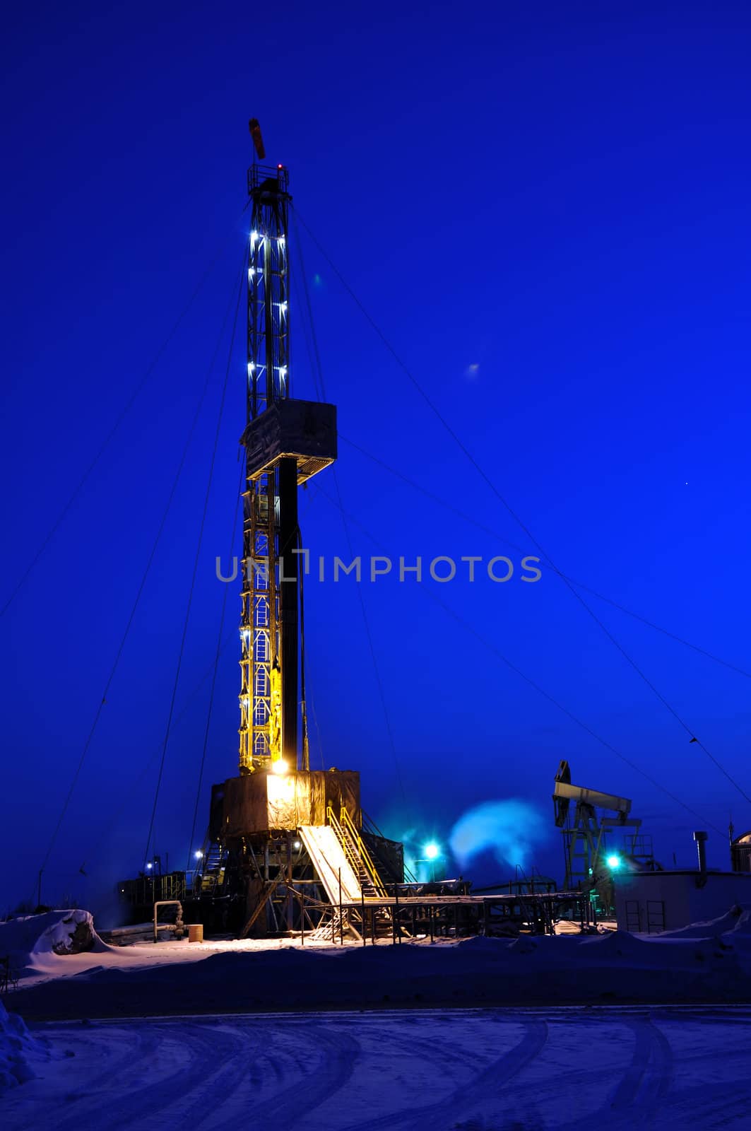 Drilling Rig at Night. Oil fields in Western Siberia