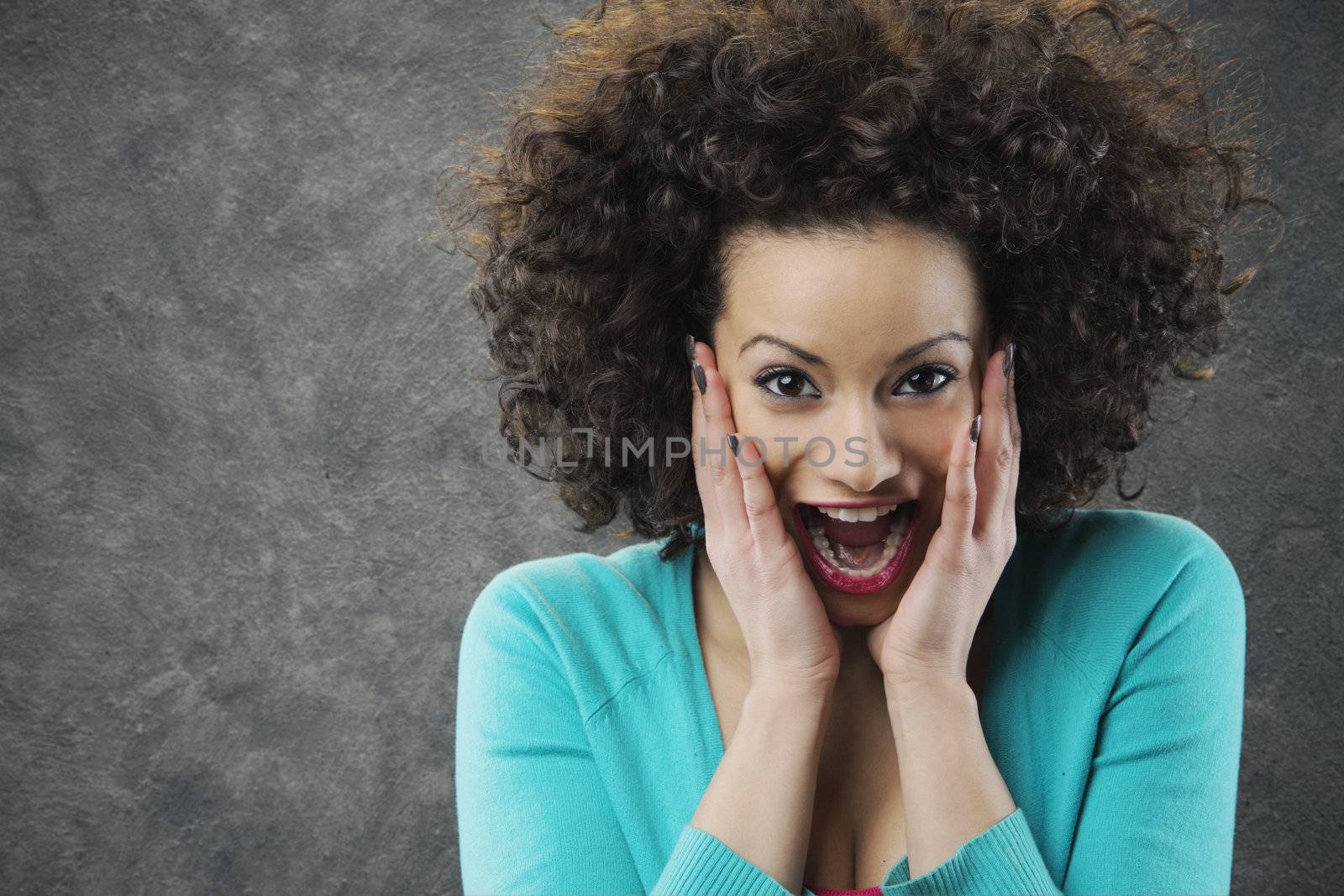 woman looks surprised and happy