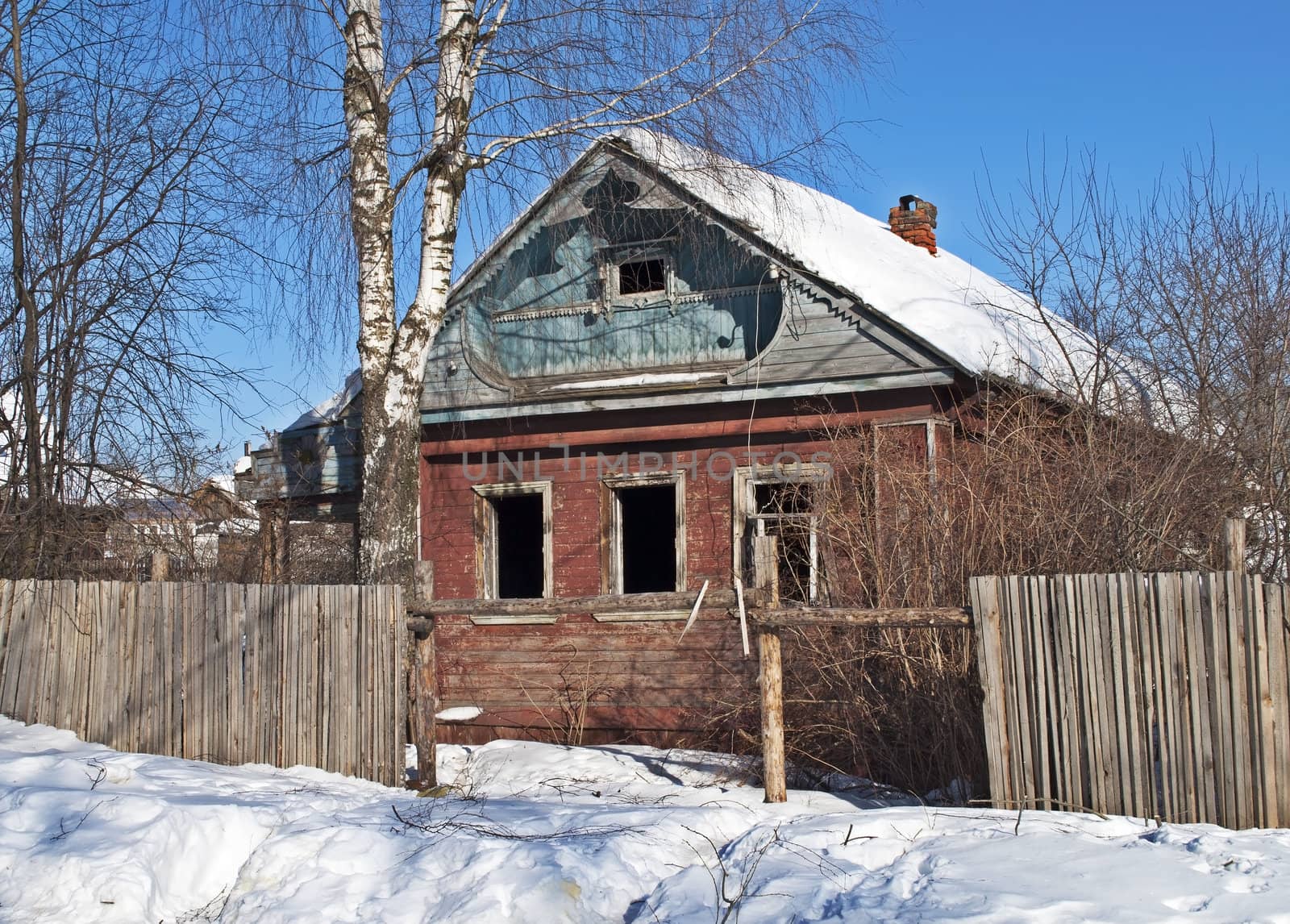 Old abandoned wooden house, winter time