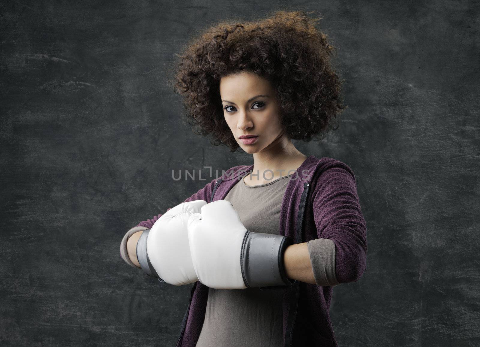 Fashion model with white boxing gloves