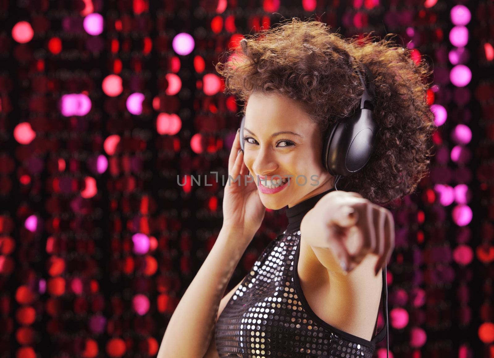 young beautiful woman enjoying music
