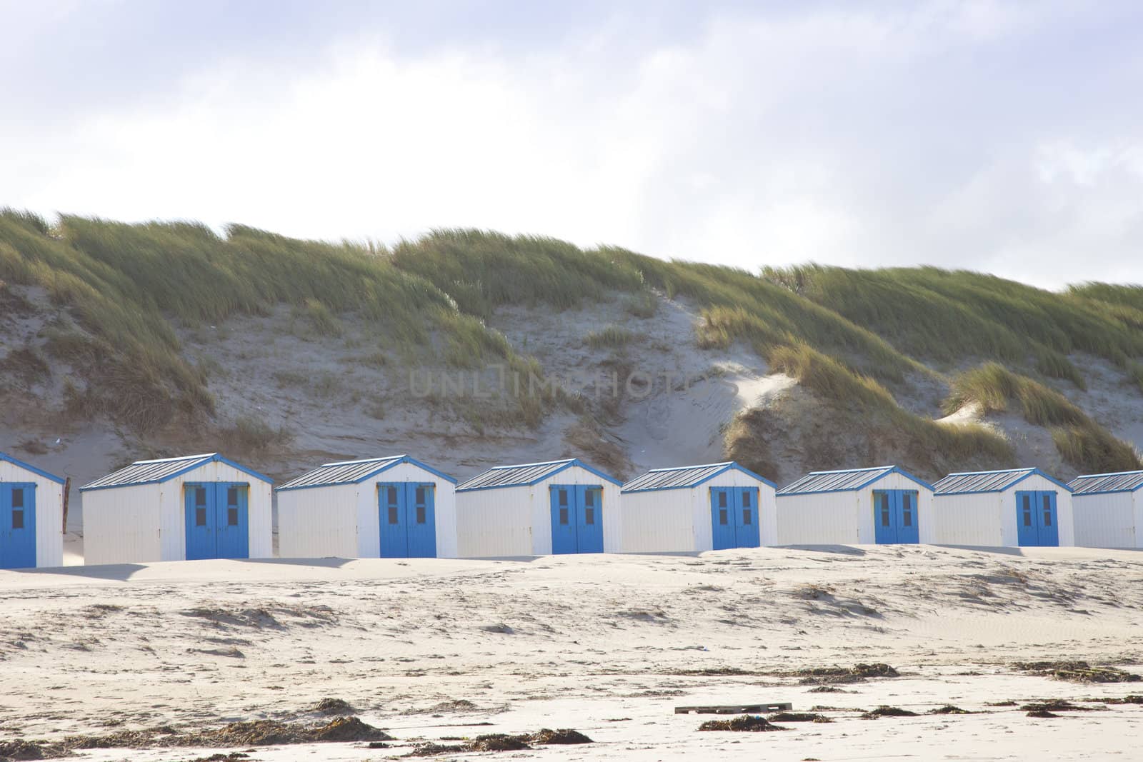 Dutch little houses on beach in De Koog Texel, The Netherlands